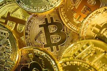 Shiny gold bitcoins covering all over