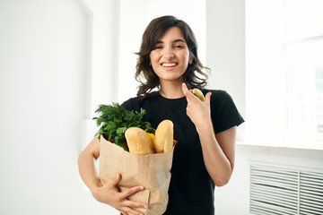 woman smiling package of products