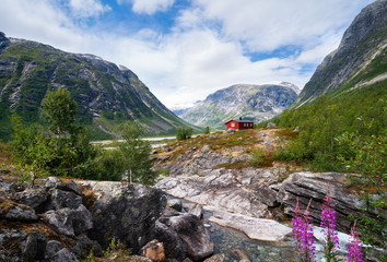 Little mountain house in the middle of the mountains in Norway