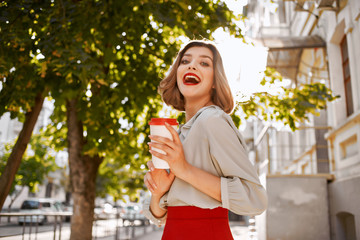 joyful woman with coffee