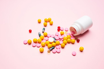 pills on pink background