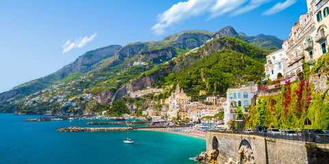 Morning view of Amalfi cityscape on coast line of mediterranean sea, Italy