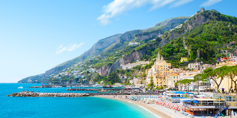Morning view of Amalfi cityscape on coast line of mediterranean sea, Italy