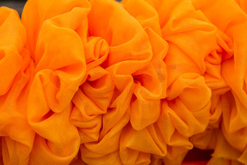 Orange curtains Made flowers,texture background.
