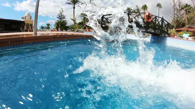 Professional video of flowing water in the swimming pool in slow motion 250fps