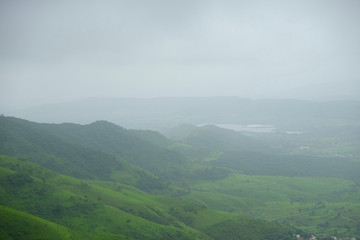 lush green landscape of mountain and hills in monsoon season, Purandar, Maharashtra, India