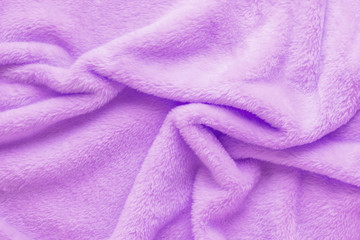 Fototapeta na wymiar spa tender concept of pink texture of towel folded like background, close up