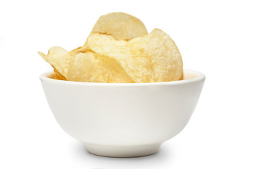 Delicious golden potato chips in a white bowl isolated on white background.