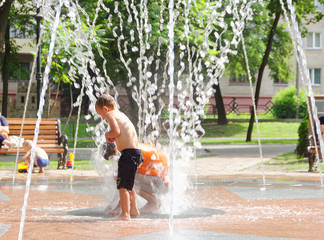 GOMEL, BELARUS Children bathing in the fountain. Square named after. Gromyko.