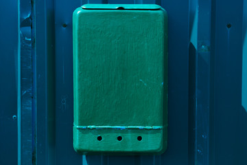 Red mailbox with green wood