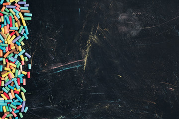 Blackboard with colorful chalk sticks