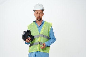 builder in a helmet with 3d glasses