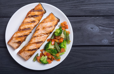 Grilled salmon fish with vegetables