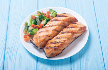 Grilled salmon fish with vegetables