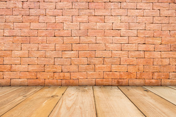 Wooden table of brown on front red brick background, for presentation and template