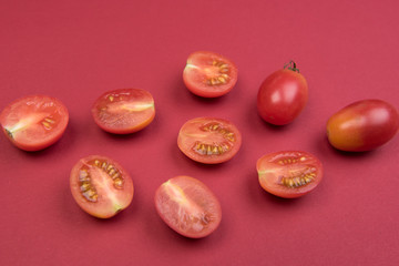 Cherry tomatoes on a colored background