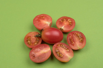 Cherry tomatoes on a colored background