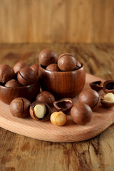 Macadamia nuts on a wooden board
