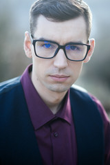 smart fashion. Man in anti-reflection glasses for visual improvement at oculist. poor eyesight and...