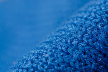 Blue fabric pullover clothing texture on blur background