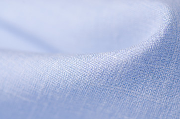 Blue fabric linen clothing on blur background