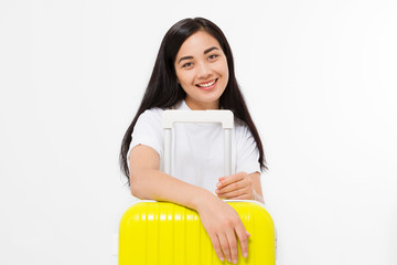 Young asian woman traveler with yellow suitcase isolated on white background. Copy space. Summer travel holidays.