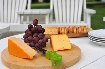 Cheese Board with Crackers and Grapes