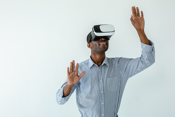Naklejka premium Curious afro american mna testing VR goggles