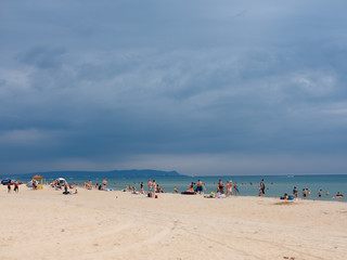 Fototapeta premium people on the sea beach