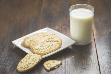 cereal cookies and a glass of milk