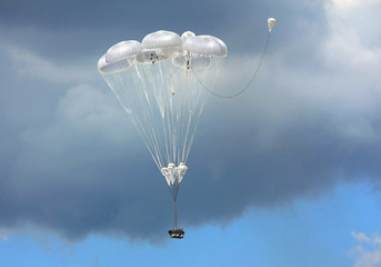 Descent by parachute