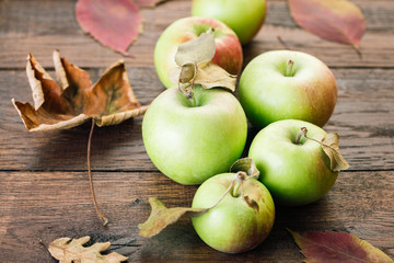 Green Apples on a Wooden Background Autumn Still Life Fallen Leaves
