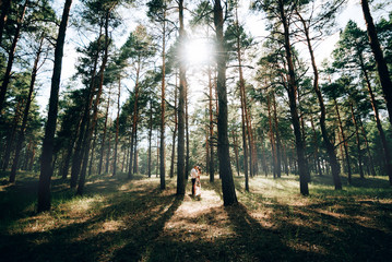 bride and groom in the forest