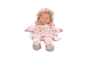 Fototapeta premium Fabric plush doll in a hat and pigtails