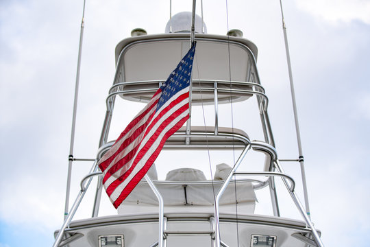 American flag attached to the luxurious yacht