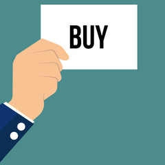 Man showing paper BUY text 