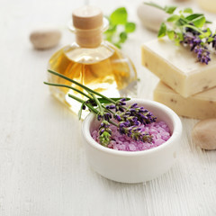 Obraz na płótnie Canvas lavender SPA: essential oils, soap, bath salt and flowers