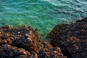 Cirstal clear sea water and cliffs