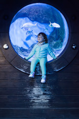 Adorable little girl at the oceanarium