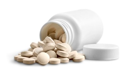 White Pill Bottle with Tablets