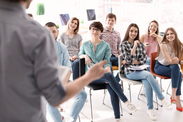 Young people having business training in office