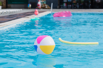 Swimming pool with stuff for kids