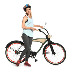 Naklejka premium Portrait of sporty woman with bicycle on white background