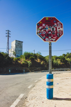 Traffic sing. Traffic sign "Stop" in stickers on the &ldquo;Punta Paloma&rdquo; beach. Tarifa, Andalusia, Spain.  Picture taken 29 july 2018.