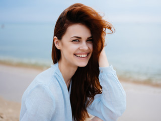 woman sitting on the beach