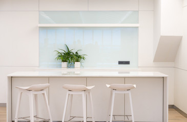 White Co-Working Space with Table and High Chair