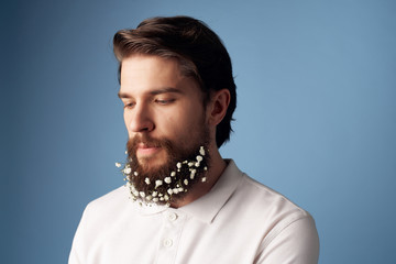 man with beard flowers