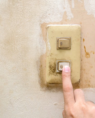 Hand pressing electronic-light switch