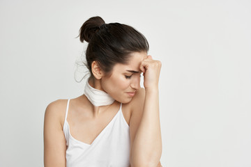 woman headache neck bandage