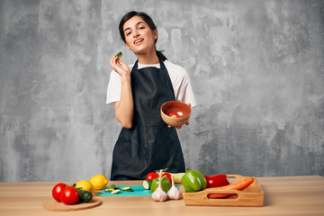 woman kitchen cooking vegetables